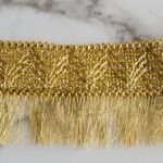 Pasamaneria Gold con flecos