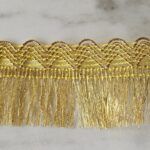 Cinta gold con flecos