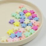 BOLSA ESTRELLAS TONOS PASTEL. 13MM X 500 GRS (7-1)