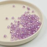 BOLSA BOLITAS FACETADAS LILA.
6MM X 500 GRS (21- 30)