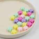 BOLSA ESTRELLAS TONOS PASTEL. 13MM X 500 GRS (7-9)