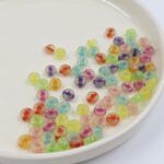 BOLSA SEMILLA CORAZÓN 7MM. BRILLAN EN LA OSCURIDAD.
X 500 GRS.