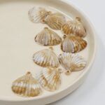 BOLSA DIJE CONCHAS DE MAR
26 MM X 500 GRS (28-3)