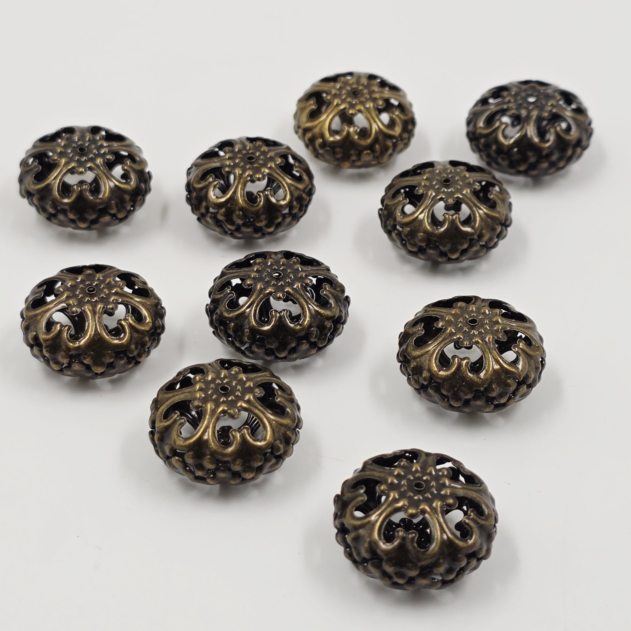 2025/02/1000601299-scaled.jpg FILIGRANA METAL BRONCE 23*13MM X 500 GRS. - Imagen 1