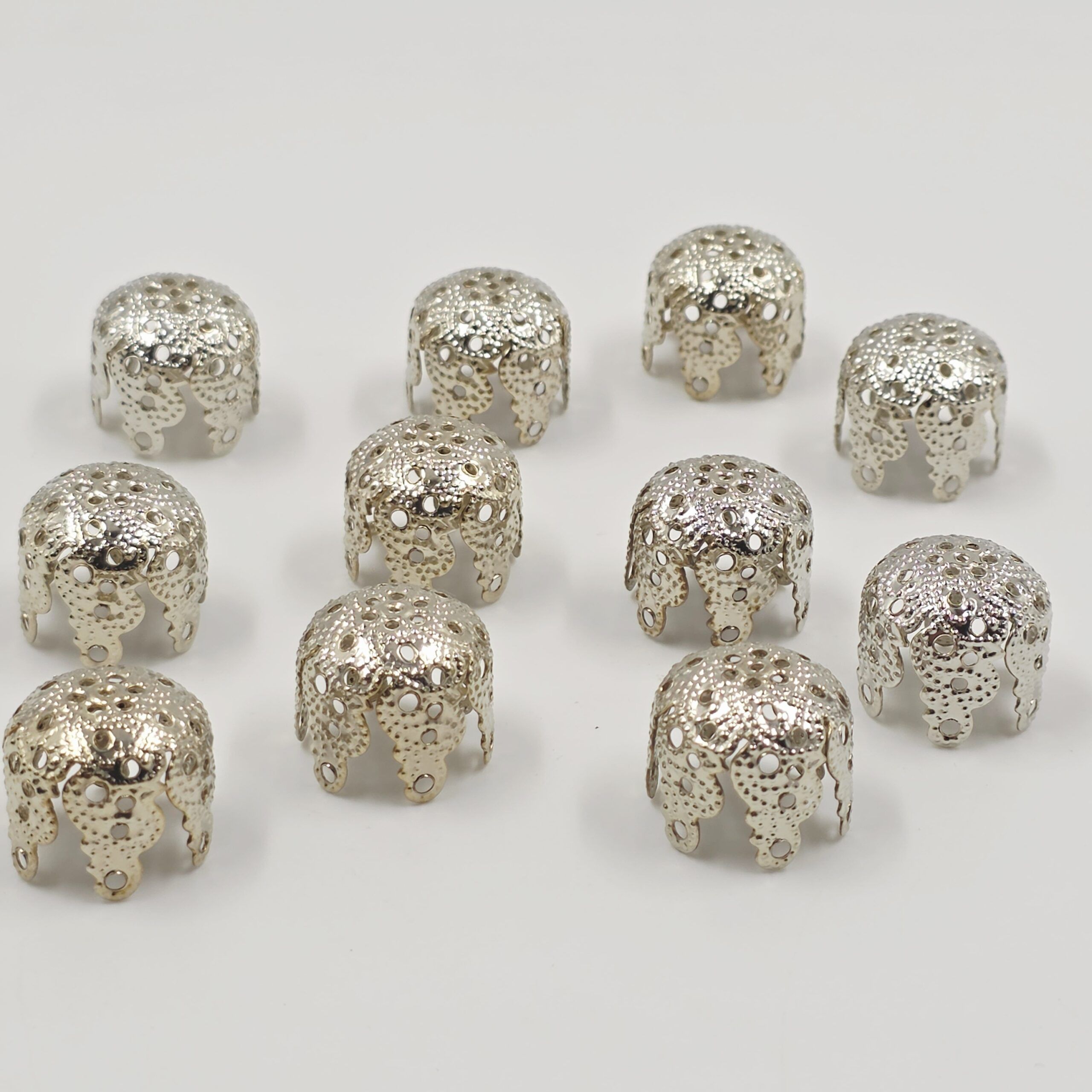 2025/02/1000601315-scaled.jpg FILIGRANA CALOTA DE METAL NIQUEL 29*20MM X 500 GRS - Imagen 1