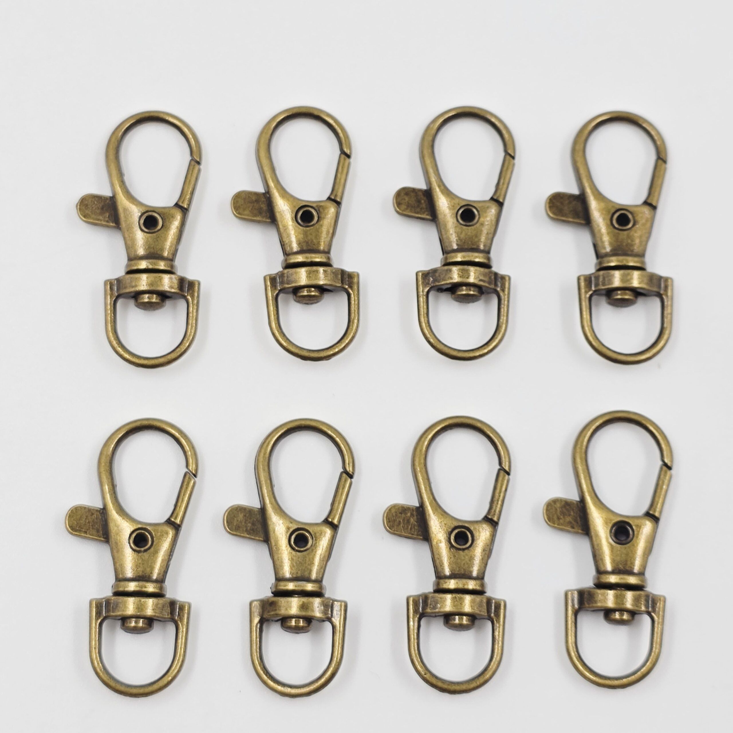 2025/02/1000605201-scaled.jpg MOSQUETÓN BRONCE 17*36MM X 100 UNIDADES. - Imagen 1