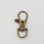 MOSQUETÓN BRONCE 17*36MM X 100 UNIDADES. - Imagen 2