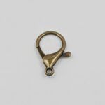 MOSQUETÓN BRONCE 25*33 MM.
X 100 UNIDADES. - Imagen 2