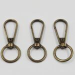 MOSQUETÓN BRONCE 17*46MM.
 X 100 UNIDADES.