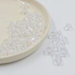 CAIREL ACRILICO FACETADO BOLITA  PASANTE 10 MM.
X 500 GRS.