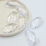 CAIREL COLGANTE ACRILICO FACETADO  ALMENDRA 50MM
X 500 GRS