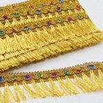 PASAMANERIA GOLD 4.5 CM DE ANCHO CON FLECOS.
X 10 YARDAS