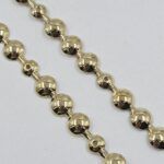 TIRA DE TACHAS 16MM GOLD X 1 METRO CADA TIRA.PACK X 200 MTS MAS TACHAS PARA COLOCACIÓN. - Imagen 2