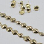 TIRA DE TACHAS 16MM GOLD X 1 METRO CADA TIRA.PACK X 200 MTS MAS TACHAS PARA COLOCACIÓN.