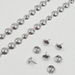 TIRA DE TACHAS NIQUEL 16MM X 1 METRO CADA TIRA.PACK X 200 MTS MAS TACHAS PARA COLOCACIÓN.