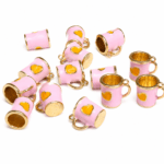 COLGANTE METAL B/GOLD TAZA CORAZON ROSA 12 UNIDADES (14X17mm APROX)