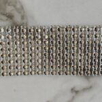 CINTA DE STRASS 8 LINEAS TONO PLATA X 10 YARDAS.