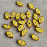 PASANTE OJO TURCO AMARILLO GOLD x12 UNIDADES(12 mm APROX.).