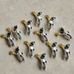 COLGANTE ASTRONAUTA SILVER ESTRELLA GOLD  x 12 UNIDADES