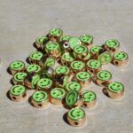 PASANTE CARITA FELIZ VERDE GOLD x 12 UNIDADES(8mm APROX.).