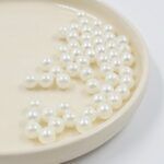 BOLSA DE PERLAS BEIGE 4MM. 
X 500 GRS.