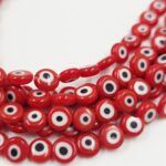 OJO TURCO DE VIDRIO 6MM ROJO.
X 1 TIRA. - Imagen 2