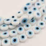 OJO TURCO DE VIDRIO 8MM BLANCO/CELESTE.
X 1 TIRA . - Imagen 2