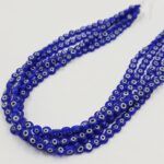 OJO TURCO DE VIDRIO 8 MM AZUL.
X 1 TIRA.