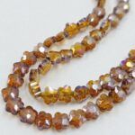 CRISTAL DE ROCA FLOR CARAMELO 
6MM.
X 1 TIRA.