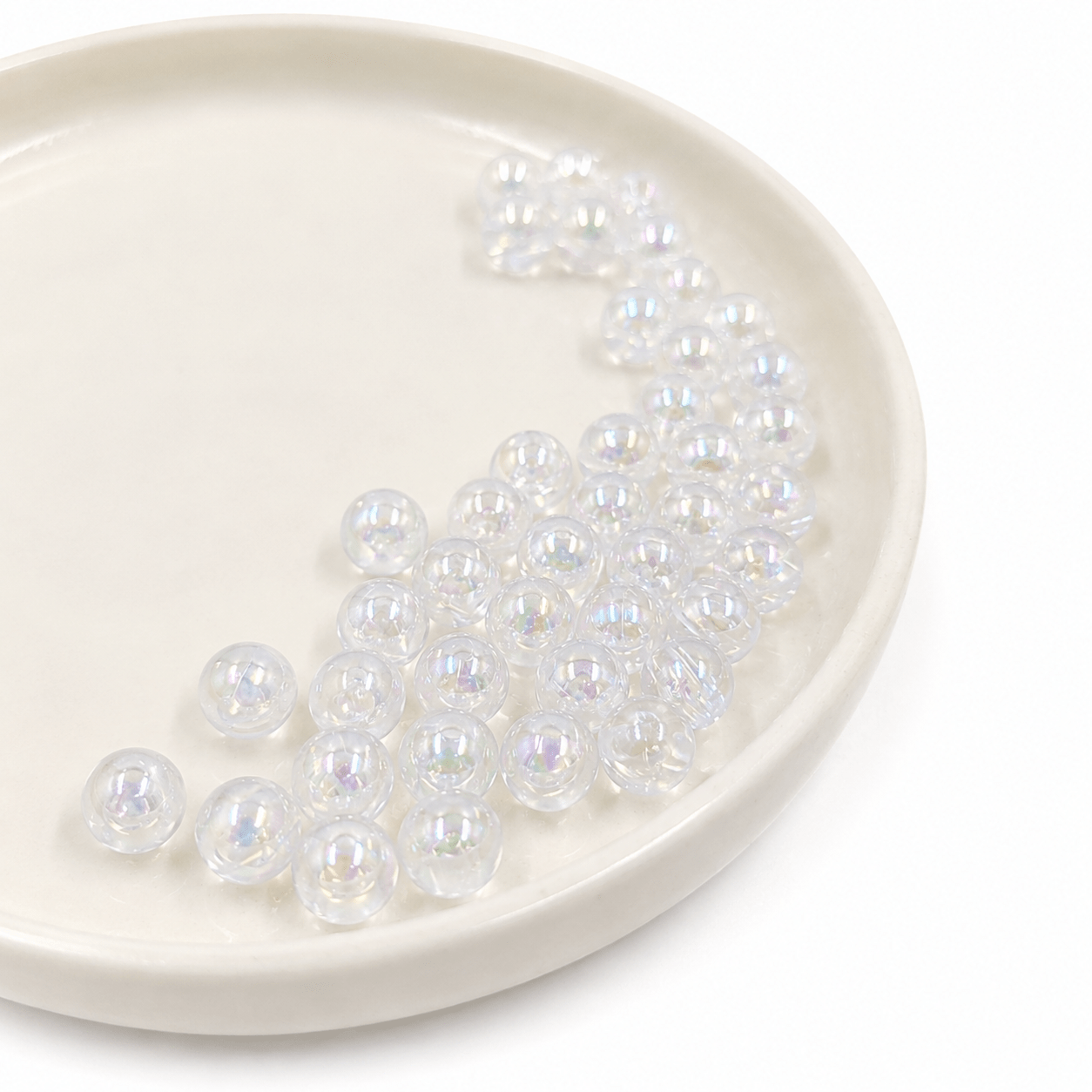 2025/05/1000820818.png BOLSA x 500 GRS PERLAS CRISTAL TORNASOL 8MM. - Imagen 1