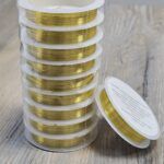 ALAMBRE DE COBRE 0.4MM X 8 METROS COLOR DORADO X 1 ROLLO. (EMA 2-6)