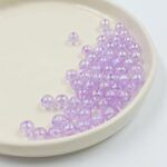 BOLSA PERLAS LILA TORNASOL 
6MM X 500 GRS (21-29-1)