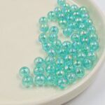 BOLSA PERLAS VERDE TORNASOL 6MM X 500 GRS.
(21-29-1)