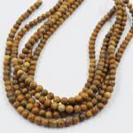 PIEDRA NATURAL JASPE LEOPARDO BOLITA 6MM X UNA TIRA 38 CM.(EMA 22-3)