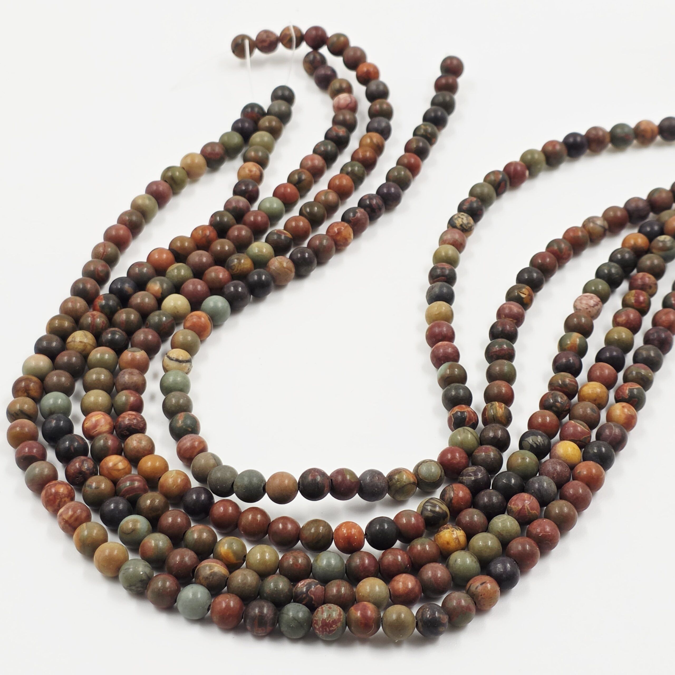 2025/06/1000605227-scaled.jpg PIEDRA NATURAL AGATA DE LA INDIA BOLITA 6MM X UNA TIRA 38 CM.(EMA 22-7) - Imagen 1