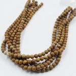 PIEDRA NATURAL JASPE MARRÓN. BOLITA 6MM  X UNA TIRA 38 CM.
(EMA 22-15)