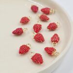 DIJE FRAMBUESA DE METAL 9*16MM X 12 UNIDADES (EMC 21-3)