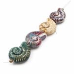 DIJE DE CERAMICA CARACOL 36*30MM TIRA x 4 UNIDADES SURTIDOS
(EMA 10-14) - Imagen 2