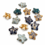 DIJE DE CERAMICA ESTRELLA DE MAR 18*18MM 15 x UNIDADES SURTIDAS. (EMA 10-12)