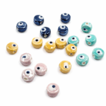 DIJE DE CERAMICA OJO TURCO 8MM
TIRA x 12 UNIDADES SURTIDAS.
(EMA 10-8)