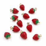 DIJE FRUTILLA DE METAL 18*11MM X 12 UNIDADES (EMC 21-1)