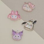 DIJE RESINA 23*17.5MM X 12 UNIDADES SURTIDO. (EMA 5-4)