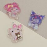 DIJE RESINA CON GLITTER 35*50MM X 12 UNIDADES SURTIDO. (EMA 5-6)