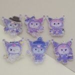 DIJE RESINA CON GLITTER 43*47MM X 12 UNIDADES SURTIDO. (EMA 5-8)