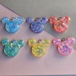 DIJE RESINA OSITO 24*24MM X 12 UNIDADES SURTIDOS. 
(EMA 5-20)