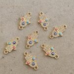 DIJE METAL STRASS MANITO FATIMA OJO TURCO CONECTOR X 12 UNIDADES. (EMA 26-10)