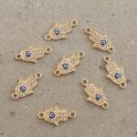 DIJE METAL STRASS MANITO FATIMA OJO TURCO CONECTOR X 12 UNIDADES. (EMA 26-12)