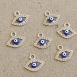 DIJE METAL OJO TURCO COLGANTE X 12 UNIDADES. (EMA 26-40)