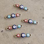 DIJE METAL OJO TURCO CONECTOR X 12 UNIDADES.(EMA 26-60)
