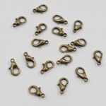 MOSQUETON BRONCE 4*2 MM.
 X 250 UNIDADES.